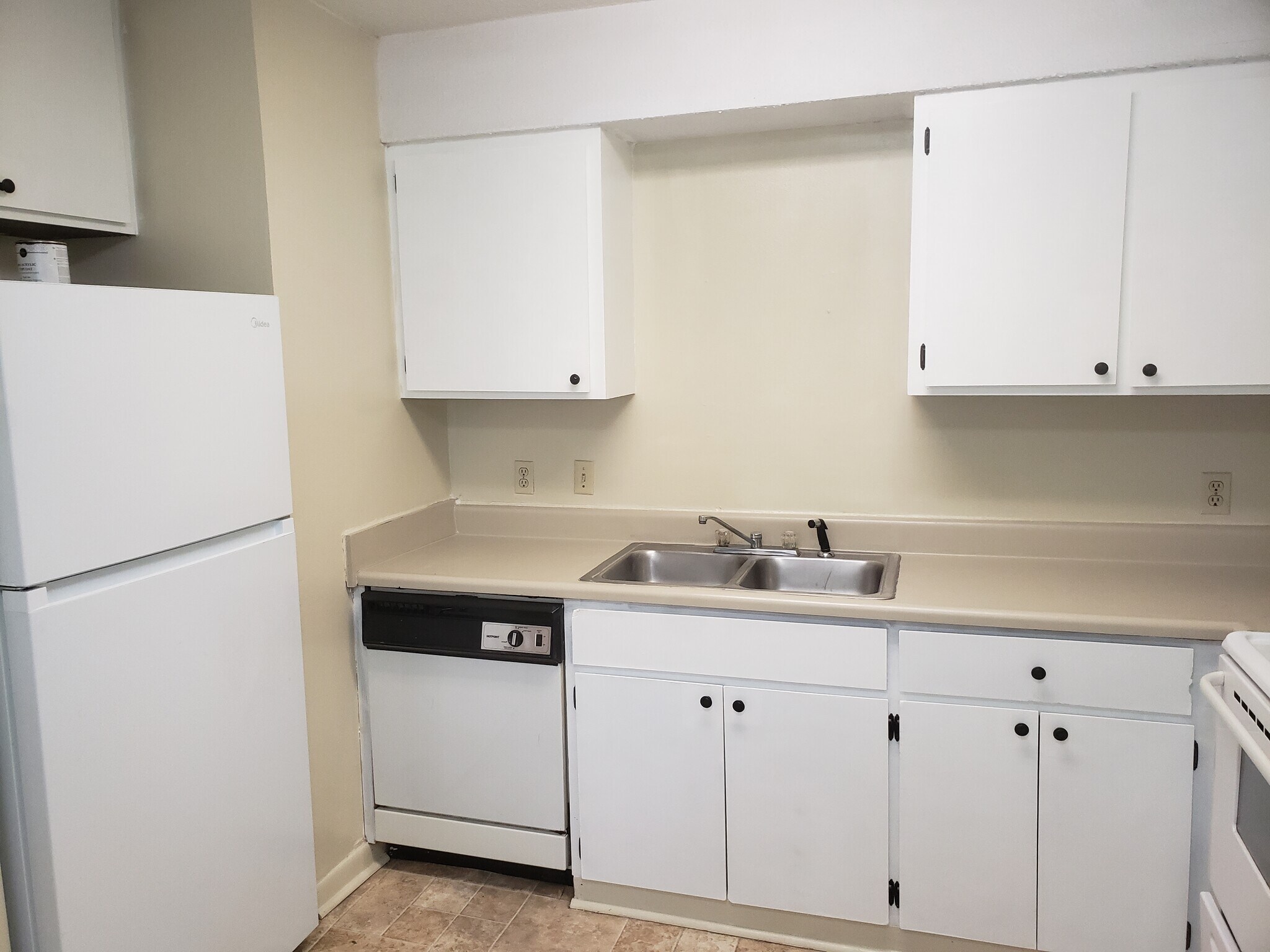 Kitchen with newly refinished updated cabinets and painted counter tops - 32A 5th St
