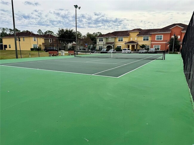 Building Photo - 8977 Coco Palm Rd