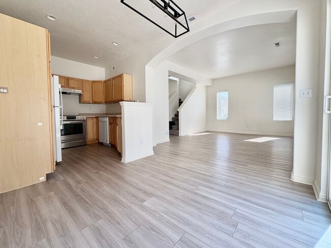 Building Photo - Spacious 3 Bed Townhome in West Valley City with Gated Yard, Garage & Pool