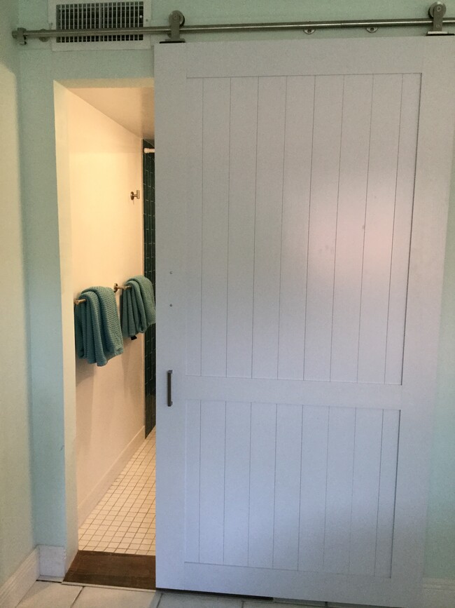 Barn Door to bath - 1541 S Ocean Blvd