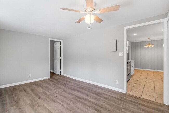 Building Photo - Updated Home with Hardwood Floors, LR & De...