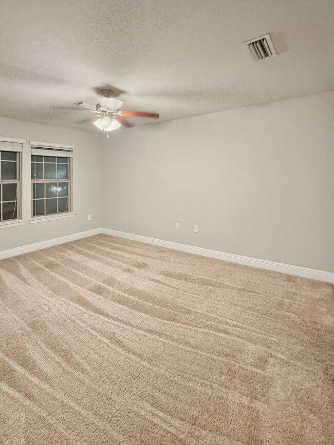 Building Photo - Now Offered at $1,970 – Prime Navarre Location Near Base & Beach