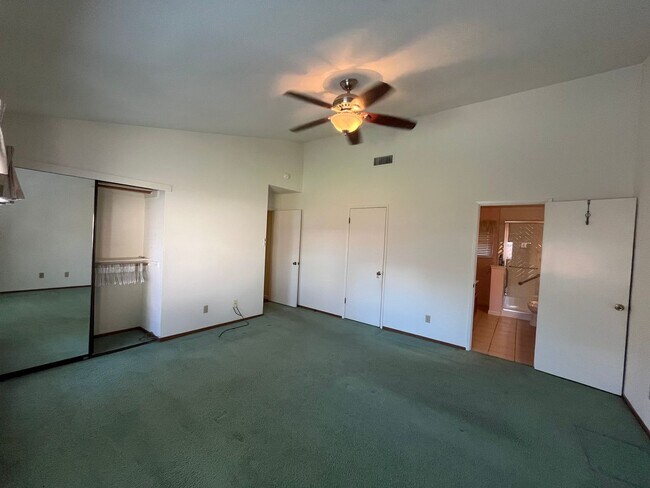 Building Photo - Spacious 4 bed 2 bath with landscaping inc...