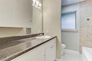 Updated bathroom with tile floor and tub/shower surround. - 4609 Nina Lee Ln