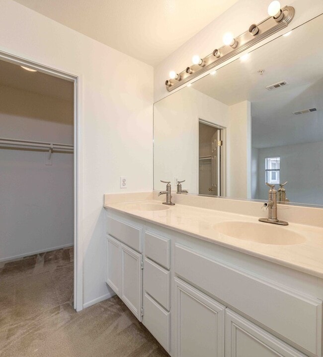 Building Photo - Gated Townhome with Updated Kitchen and Private Backyard