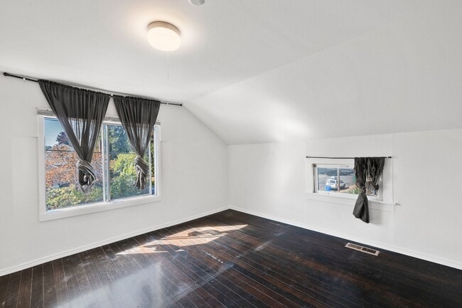 Building Photo - 1/2 Month Free! Storybook Farmhouse - Updated Kitchen, A/C, Basement, Fenced Yard, Garage, Laundr...