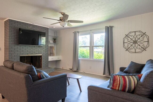 Building Photo - Classic brick rancher with carport and updated decor