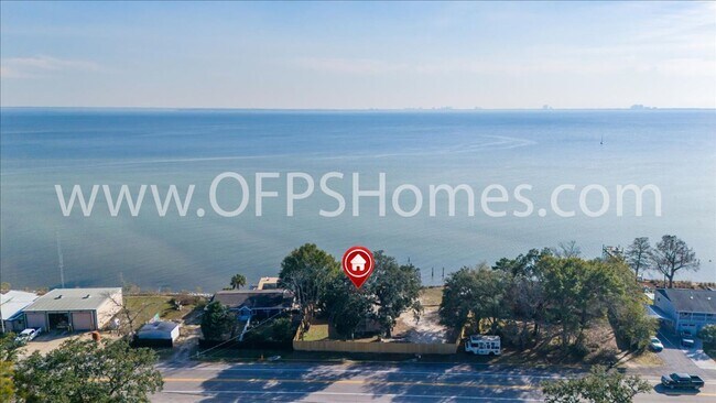Building Photo - Stunning 4-Bedroom, 3-Bath Waterfront Home in Choctaw Beach – 140ft of Bayfront Bliss!