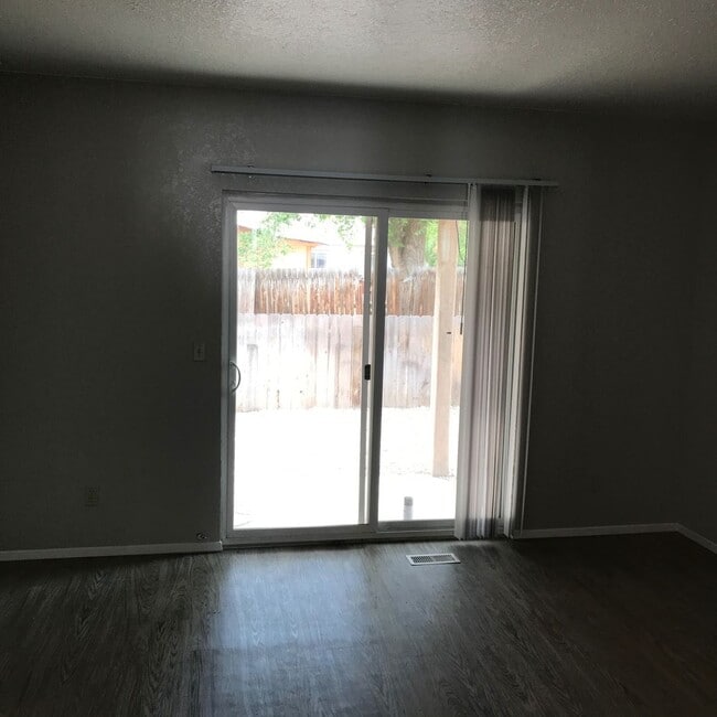 Building Photo - Updated 2 BR / 1.5 BA End Unit – Private Yard & Fresh Interior!