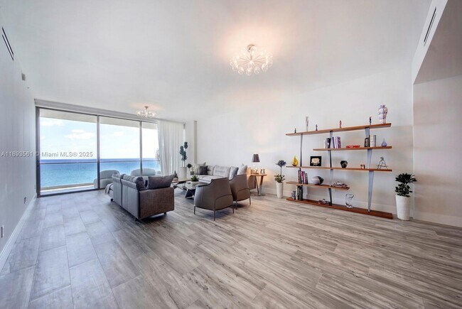 Building Photo - 10203 Collins Ave