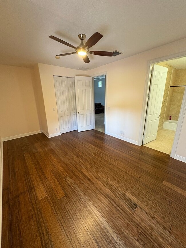 Building Photo - Spacious 3/3.5 3 car garage home in Palm City