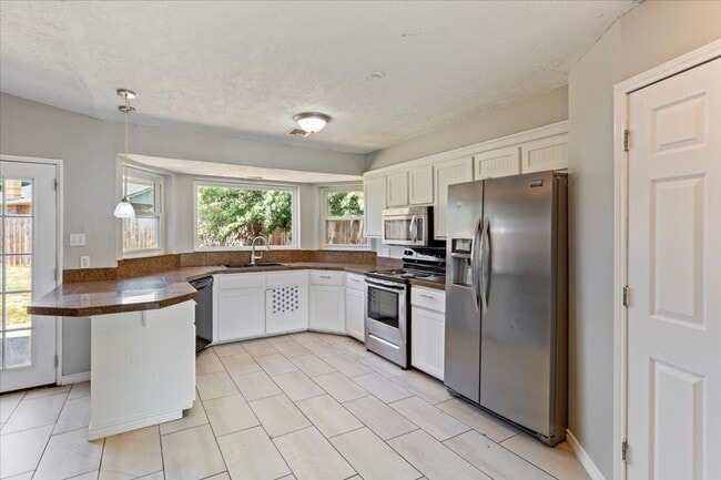 Building Photo - 6815 SW Fenwick- COMING SOON!