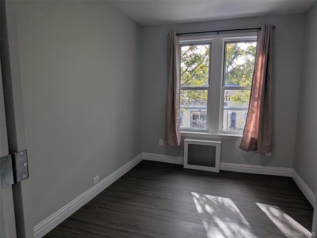 Building Photo - 205-17 Hollis Ave