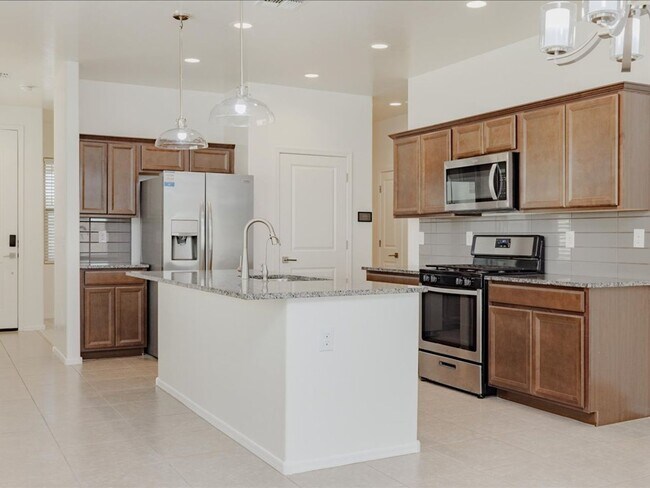 Building Photo - 3 Bedroom 2 Bathroom With Den      SOLAR PANELS! BRAND NEW FULL INTERIOR PAINT!! BRAND NEW EPOXY ...