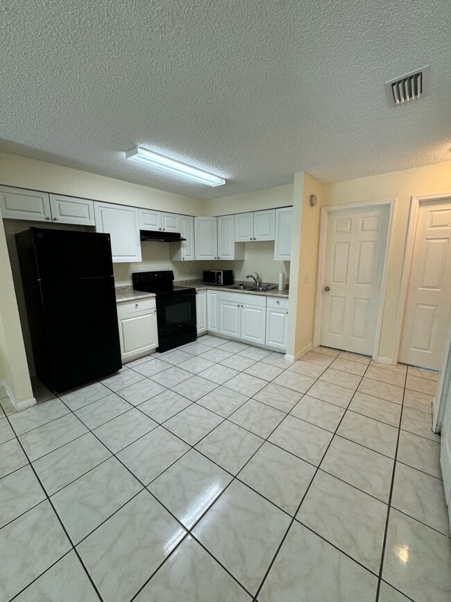 Kitchen - 1411 E 109th Ave