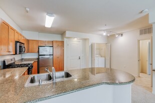 Chef inspired kitchens featuring  granite countertops - Windsor Lofts at Universal City