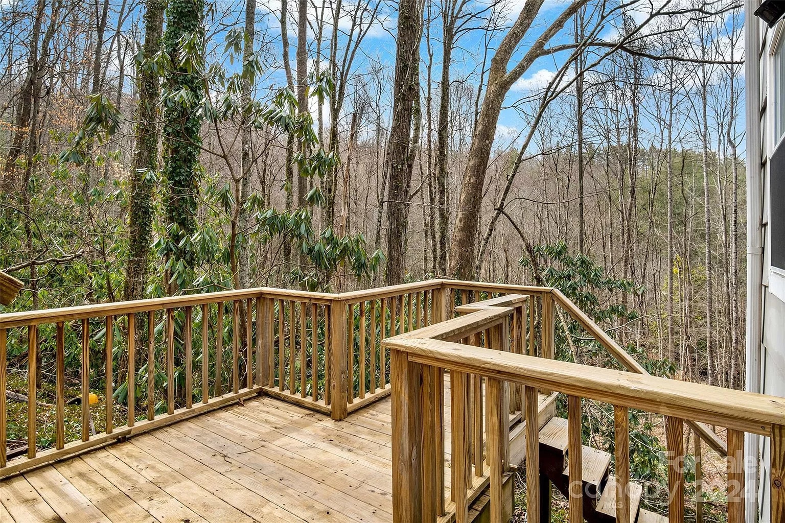 Private deck that is perfect for a small patio set. - 228 Barrett Rd