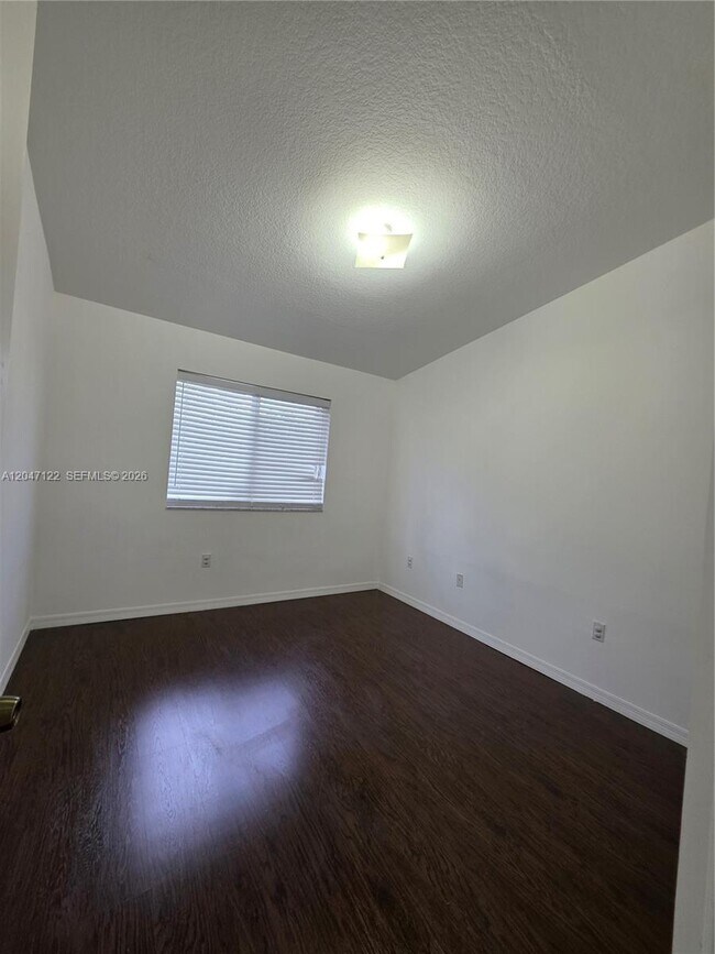 Building Photo - 3398 NE 9th Dr