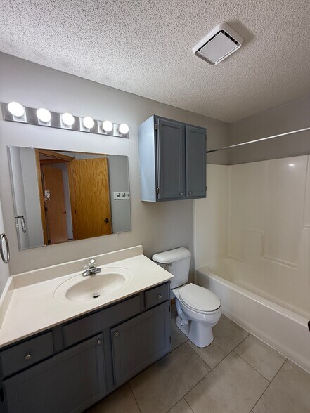 Bathroom with full shower, tub - 2240 Ranchview Ln N