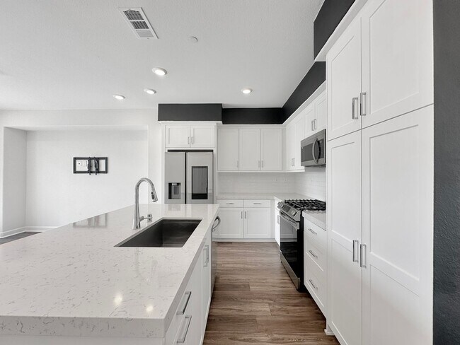 Building Photo - Luxury 3-Level Townhome for Rent | 2BR + 3BA | 1,500 Sq Ft with 2-Car Garage