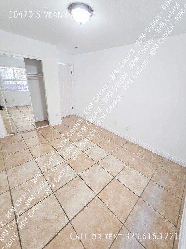 Building Photo - 10470 S Vermont Ave