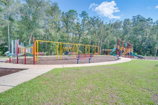 Building Photo - 4-Bed, 2-Bath Home in Woodlands Subdivision with Solar, Open-Concept Living, Modern Kitchen, Fenc...