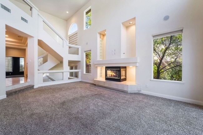 Building Photo - Beautiful Three Story, Five Bedroom Home with Lagoon Style Pool and Spa