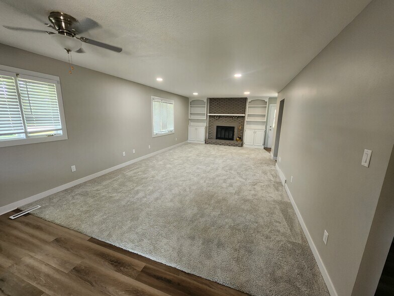 Living room with fire place - 4660 NW 62nd Ave