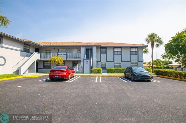 Building Photo - 10687 Royal Palm Blvd