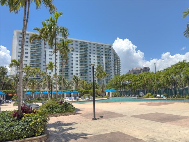 Building Photo - 19370 Collins Ave