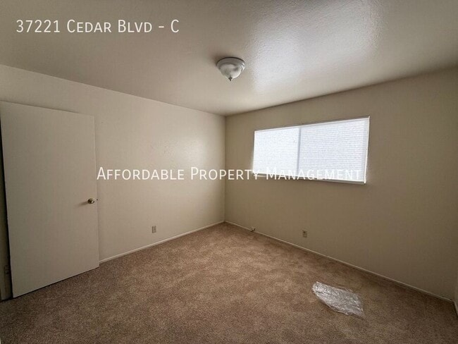 Building Photo - 37221 Cedar Blvd