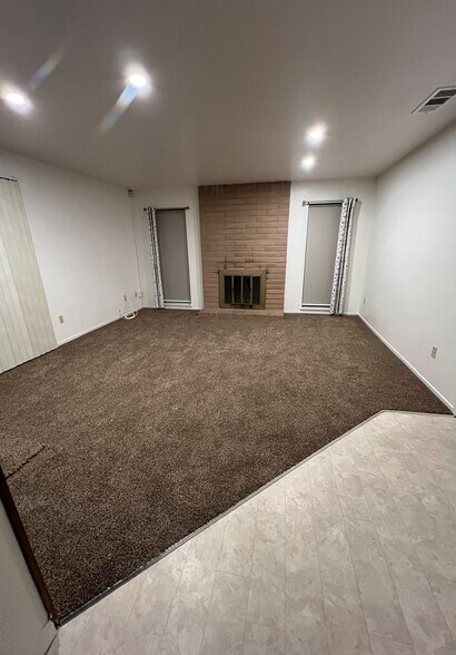 Family room with fireplace - 9012 Cornwall Dr