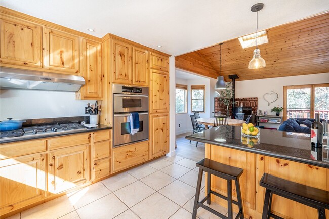 Building Photo - Charming 3 Bed Mountain Retreat | Wood Beams, Fireplace & Deck