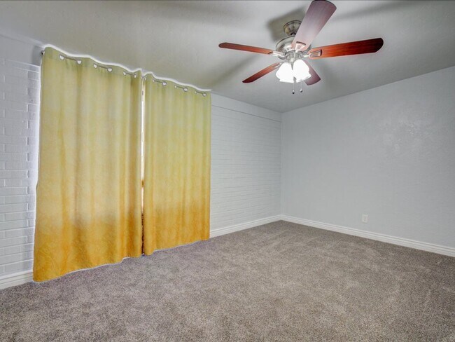 Building Photo - Spacious 4-Bedroom, 2-Bath Home with Extended Driveway & Large Backyard