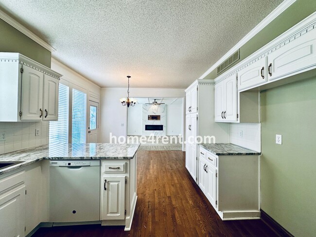 Building Photo - Beautiful Four Bedroom Olathe Home w/ Wood...