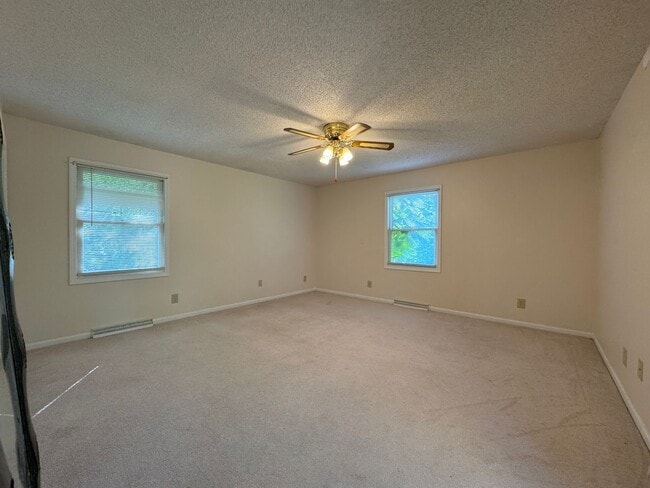 Building Photo - Beautiful Duplex Located in Serene, Wooded...