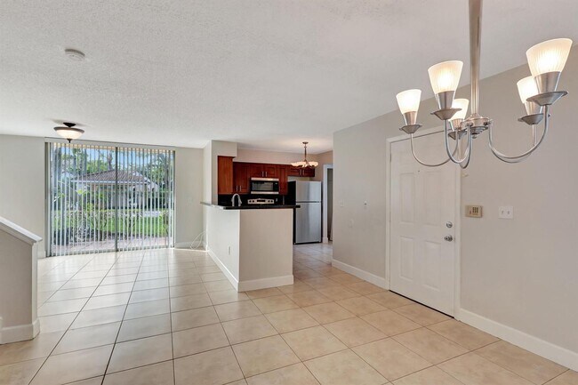 Building Photo - Spacious 3BR/2.5BA in Gated Milano Community