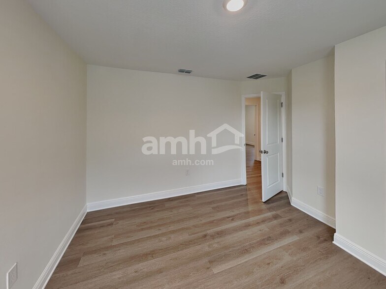 Building Photo - 6004 Pinewood Ests Dr