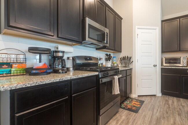 Building Photo - Gorgeous Two Story Home Featuring 2 Living spaces, 5 Bedrooms, and 3.5 Baths