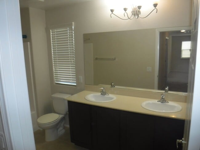 Building Photo - SPACIOUS 4 BEDROOM HOME WITH 2.5 BATHS, 2 ...