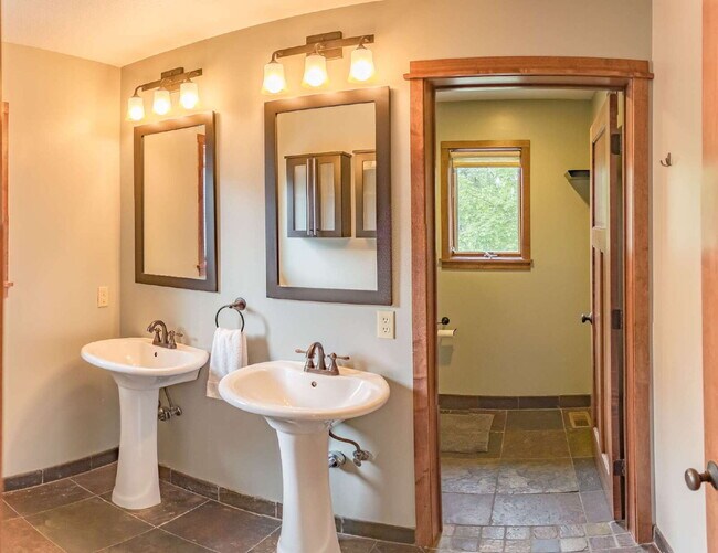 Building Photo - Spacious 5-Bedroom Minneapolis Gem with Gas Fireplace & Finished Basement