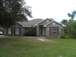 Building Photo - BEAUTIFUL BRICK 4 BEDROOM 2 BATH HOME AVAILABLE NOW CONTACT KAREN GUARDINO, REALTOR 386-747-9295