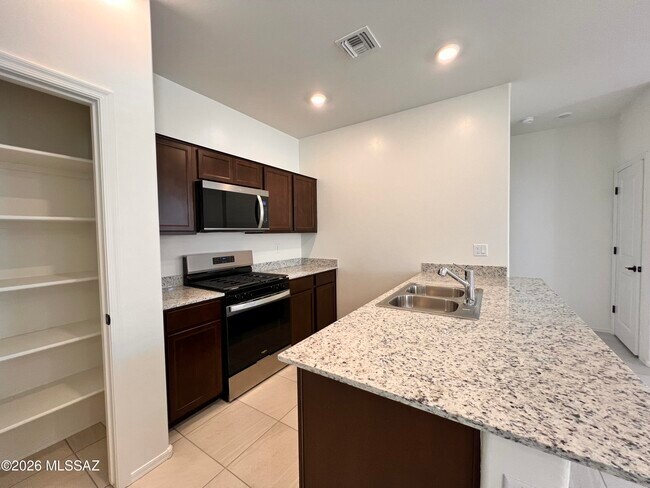 Building Photo - 9759 E Panopeia Dr