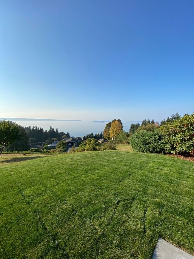 Building Photo - Modern 4-Bedroom Home with Panoramic Water & Mountain Views