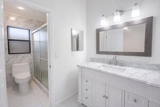 Building Photo - 3950 Cocoplum Cir