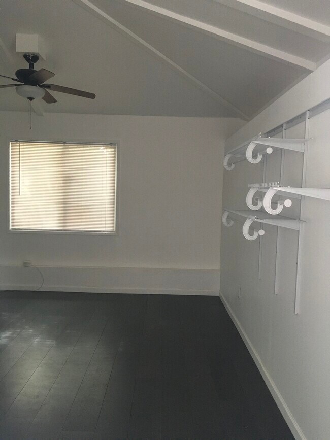 Side window/storage racks - 2220 Rollingwood Dr