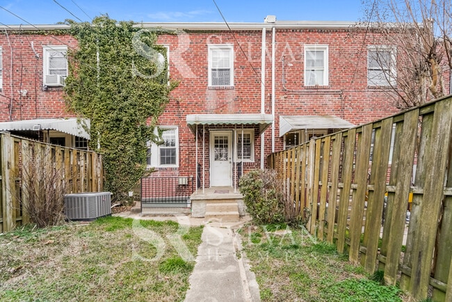 Building Photo - Welcome to this charming abode.
