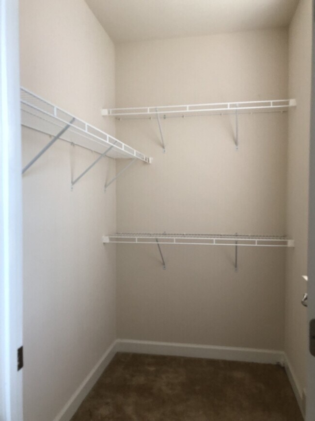 Building Photo - 2 Level Townhouse/condo with one car garage in the Watkins Mill Town Center