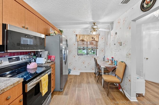 Building Photo - 4587 Carambola Cir S