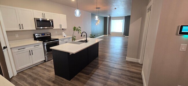 Building Photo - Come check out this beautiful 3 story town...
